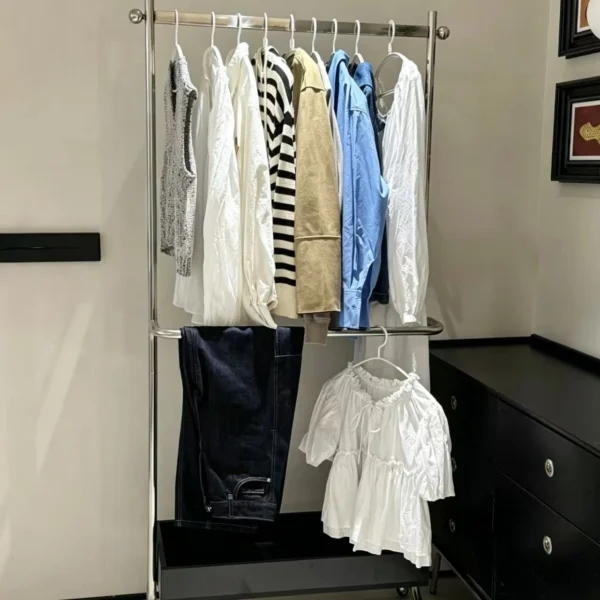 The clothes hangers are full of clothes left overnight