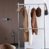 The coat is hung on the clothes hanger overnight
